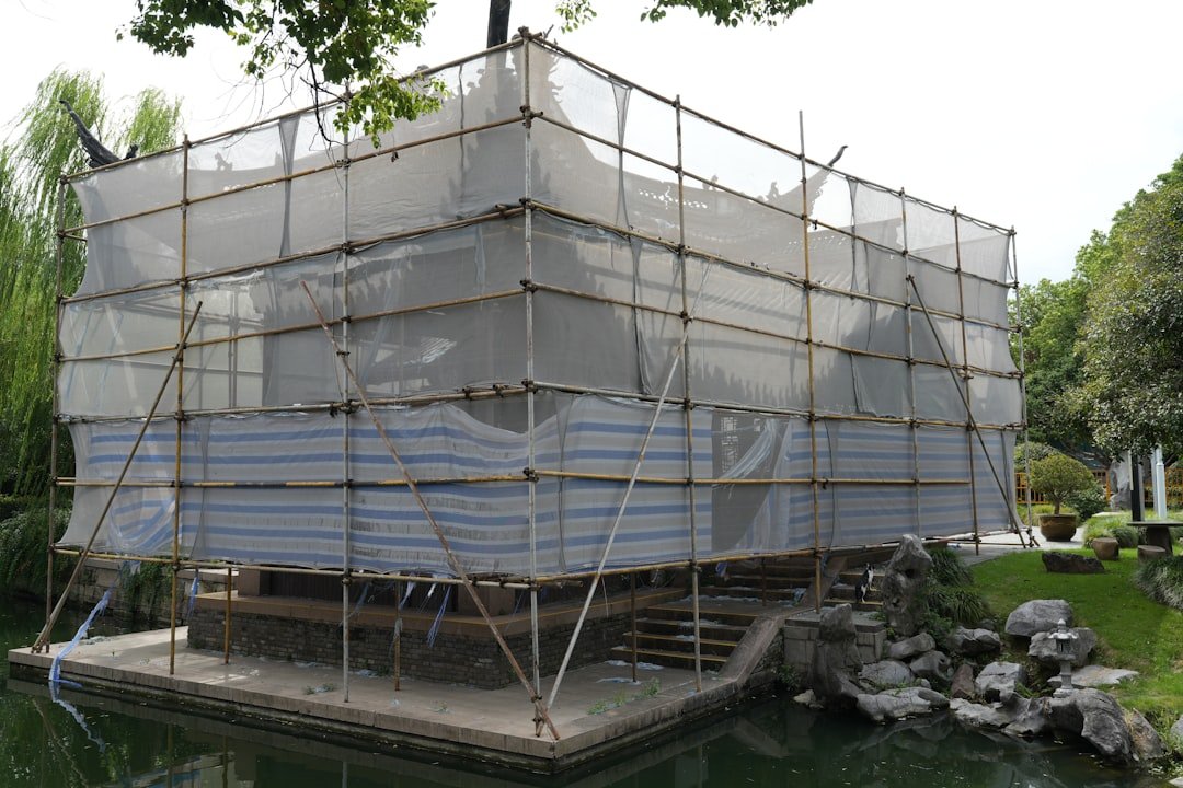 About building-covered-in-scaffolding-and-netting-for-renovation-cprlp9n9nta